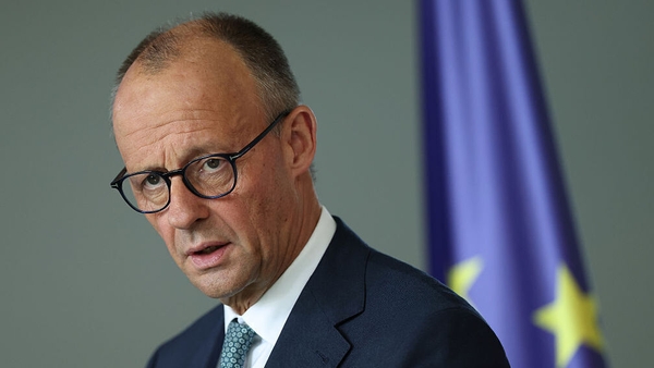 German Chancellor Friedrich Merz speaks to the media