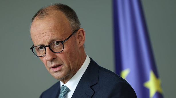 German Chancellor Friedrich Merz speaks to the media
