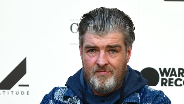 A view of Paul Gallagher attending a film premiere in 2019 in London