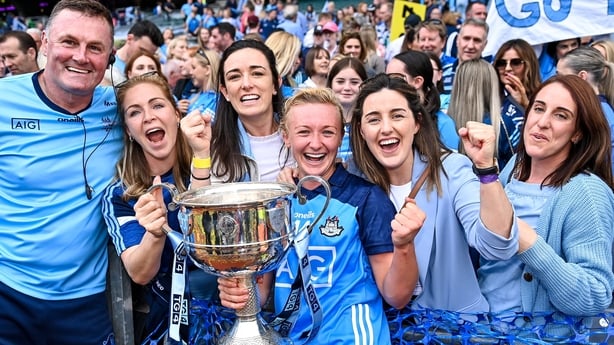 2023 All-Ireland final Dublin captain Carla Rowe and team manager Mick Bohan celebrate with former team-mates, from left, Sinéad Finnegan, Niamh McEvoy, Lyndsey Davey and Siobhán McGrath