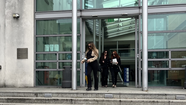 Three women walk out of Dundalk court house