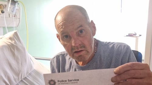 Eugene Thompson with the formal apology from the PSNI delivered to him in hospital a week before his death