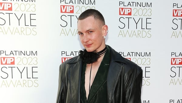 a person in a black coat