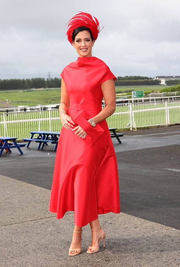 a woman in a red dress