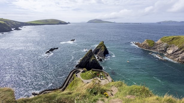 WILD ATLANTIC WAY, IRELAND - AUGUST 14: The Dunquin Pier on August 14, 2024 in Ireland. Dunquin Pier is a picturesque cliff and offers views of the rugged coastline and the vast Atlantic Ocean. It is a must see destination for travelers exploring the scenic landscapes of the Dingle Peninsula. The Du