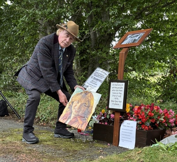 William Godfrey, who used to present the Miami Showband on stage during gigs, lays a tribute at the memorial near Newry