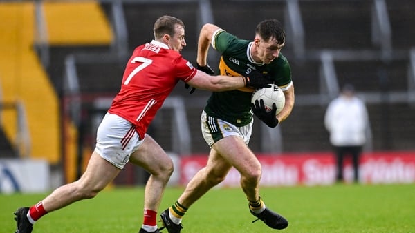 Barry Dan O'Sullivan of Kerry in action against Matty Taylor of Cork