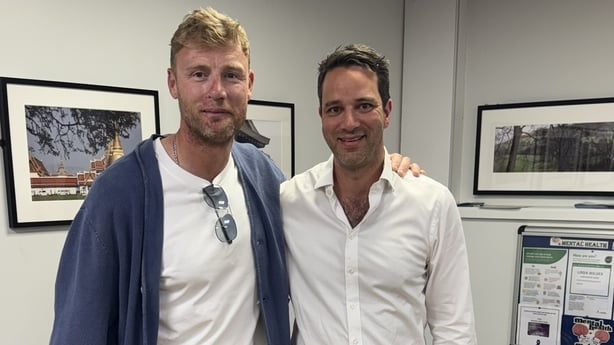 Andrew Flintoff and St George's Consultant Oral and Maxillofacial Surgeon Jahrad Haq pose for a photo