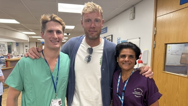 William Harland, registrar in Trauma and Orthopaedics, Andrew Flintoff and Shamim Umarji, Consultant Trauma and Orthopaedic Surgeon, pose for a photo