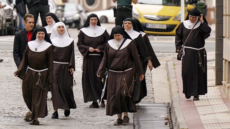 Eight former nuns of the order of the Poor Clares of Belorado arrive to court for a trial hearing in their eviction lawsuit