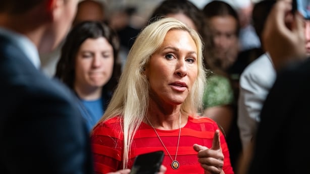 Representative Marjorie Taylor Greene, a Republican from Georgia, speaks to members of the media as she arrives for a House Republican caucus meeting at the US Capitol in Washington, DC, US, on Tuesday, July 22, 2025. Republican Representative Anna Paulina Luna has asked the Department of Justice to