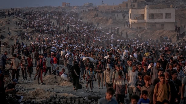GAZA CITY, GAZA - JUNE 17: Palestinians flock to the aid center set up by the US and Israeli-led Gaza Humanitarian Relief Foundation on the Coastal Road in the Sudaniya area to receive food package in northern Gaza City, Gaza on June 17, 2025. (Photo by Saeed M. M. T. Jaras/Anadolu via Getty Images)