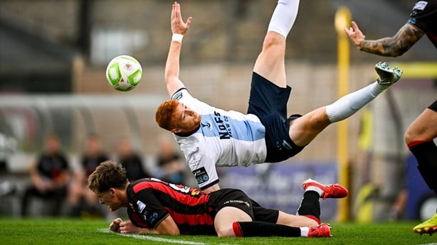 1 August 2025; James Bolger of Drogheda United and Cian Byrne of Bohemians collide during the SSE Airtricity Men's Premier Division match between Bohemians and Drogheda United at Dalymount Park in Dublin. Photo by Seb Daly/Sportsfile