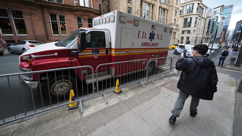 A member of the public takes a photo of a prop of a Fire Department of the City of New York ambulance on set in Glasgow, as workers prepare for the filming of the new Spider-Man, Spider-Man: Brand New Day. Photo credit: Andrew Milligan/PA Wire