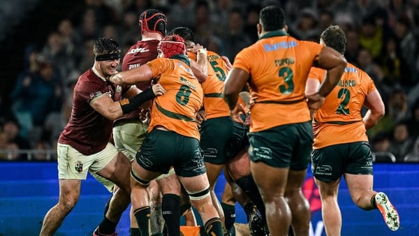 2 August 2025; Tom Curry of British & Irish Lions, left, and Harry Wilson of Australia, 8, tussle during the third test match between Australia and the British & Irish Lions at Accor Stadium in Sydney, Australia. Photo by Brendan Moran/Sportsfile
