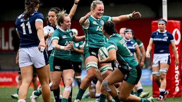2 August 2025; Ireland debutant Nancy McGillivray is congratulated by team-mates, including Fiona Tuite, after scoring her side's third try during the Women's Rugby World Cup warm-up match between Ireland and Scotland at Virgin Media Park in Cork. Photo by Shauna Clinton/Sportsfile