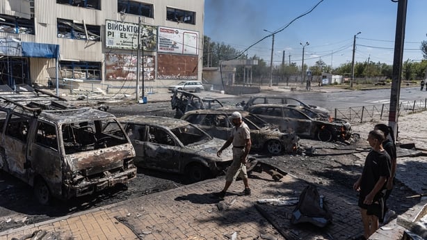 a Russian drone strike hit a market area in Druzhkivka, Ukraine