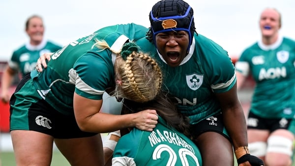 2 August 2025; Deirbhile Nic A Bháird of Ireland, 20, is congratulated by team-mates Neve Jones, left, and Linda Djougang after scoring her side's fifth try during the Women's Rugby World Cup warm-up match between Ireland and Scotland at Virgin Media Park