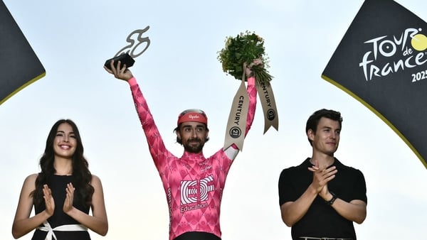 Ben Healey celebrates on the podium with the most combative rider's award at the 2005 Tour de France