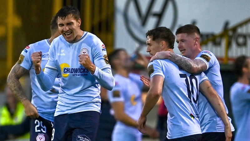 Sean Boyd (L) celebrtes his goal at the Showgrounds