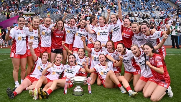 3 August 2025; The Tyrone players celebrate with the cup after their side's victory in the TG4 All-Ireland Ladies Football Intermediate Championship final match between Laois and Tyrone at Croke Park in Dublin. Photo by Piaras Ó Mídheach/Sportsfile 