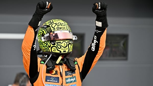 McLaren's British driver Lando Norris celebrates after winning the Formula One Hungarian Grand Prix at the Hungaroring circuit in Mogyorod near Budapest, Hungary.
