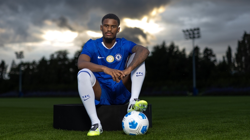 Jorrel Hato poses for photos as he signs for Chelsea Football Club at Chelsea Training Ground on August 03, 2025 in Cobham, England.