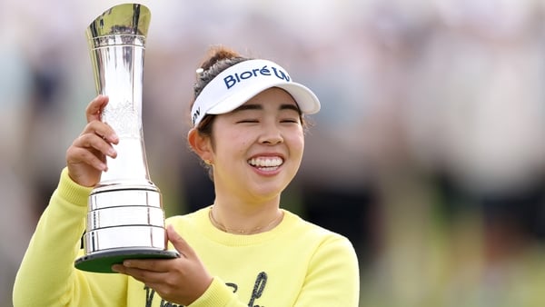 Miyu Yamashita of Japan poses for a photo with the trophy following the final round of the AIG Women's Open 2025 at Royal Porthcawl Golf Club