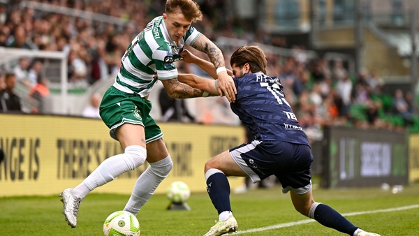 3 August 2025; Danny Grant of Shamrock Rovers in action against Brandon Fleming of Derry City during the SSE Airtricity Men's Premier Division match between Shamrock Rovers and Derry City at Tallaght Stadium in Dublin. Photo by Ben McShane/Sportsfile