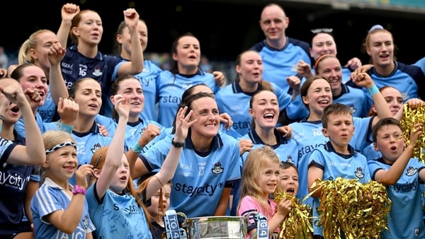 Dublin players, including Hannah Tyrrell, centre, celebrate after their side's victory in the TG4 All-Ireland Ladies Football Senior Championship final match between Dublin and Meath at Croke Park in Dublin