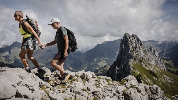 Partners Patrick and Cathy walk in the alps