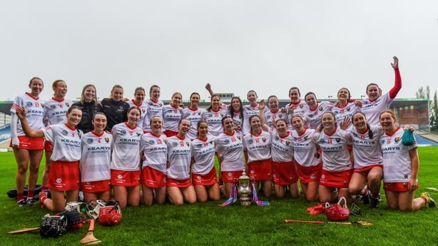 13 April 2025; Cork players celebrate with the cup after the Very National Camogie League Division 1A final match between between Cork and Galway at FBD Semple Stadium in Thurles, Tipperary. Photo by Tom Beary/Sportsfile