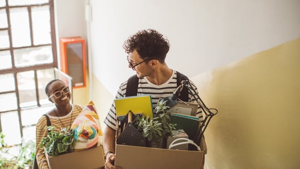 Flatmates moving in college dorm