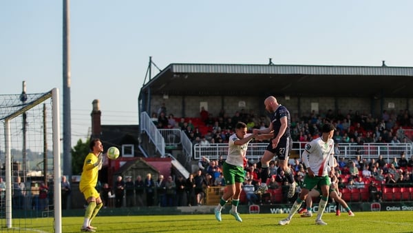9 May 2025; Liam Boyce of Derry City has a header on goal saved by Cork City goalkeeper Tein Troost during the SSE Airtricity Men's Premier Division match between Cork City and Derry City at Turner's Cross in Cork. Photo by Michael P Ryan/Sportsfile