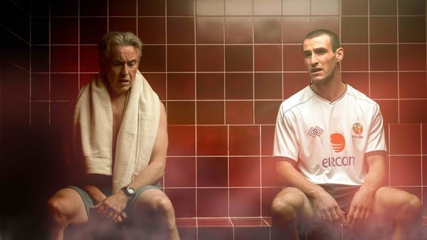 Steve Coogan as Mick McCarthy and Éanna Hardwicke as Roy Keane in a sauna in Saipan