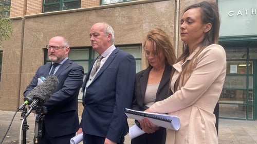 Shannon McQuillan's family speaking to the media outside the office of the Police Ombudsman in Belfast