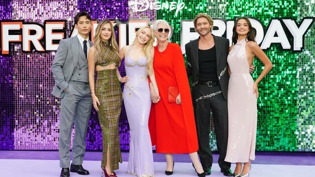 Manny Jacinto, Julia Butters, Lindsay Lohan, Jamie Lee Curtis, Chad Michael Murray, and Sophia Hammons pose for a photo at the Freakier Friday UK premiere