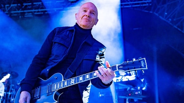 Midge Ure performing onstage