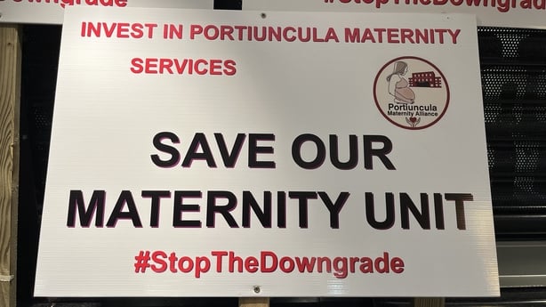 Sign that reads 'save our maternity unit' at a public meeting of the Portiuncula Maternity Alliance