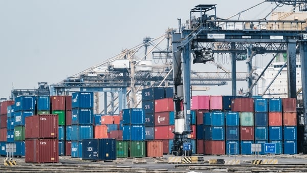 Cargo containers are stacked at a Container Port