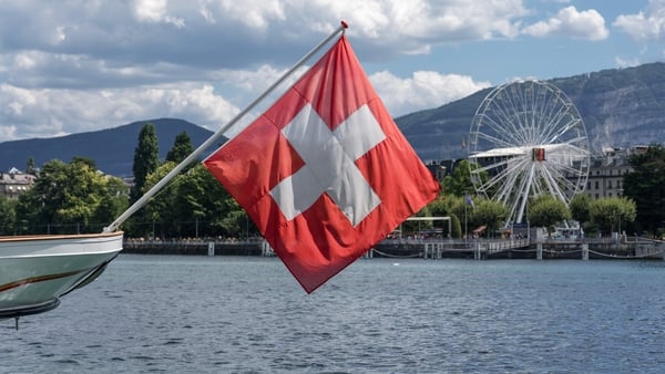 A Swiss national flag on a boat on Lake Geneva