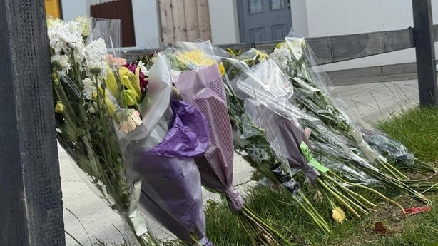 Floral tributes at the home of Ian Walsh, who was found dead on Monday morning