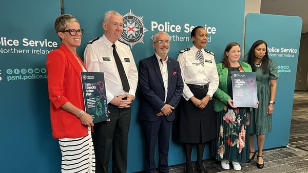 Members of the PSNI stand for a photocall to launch its ethnic minorities plan