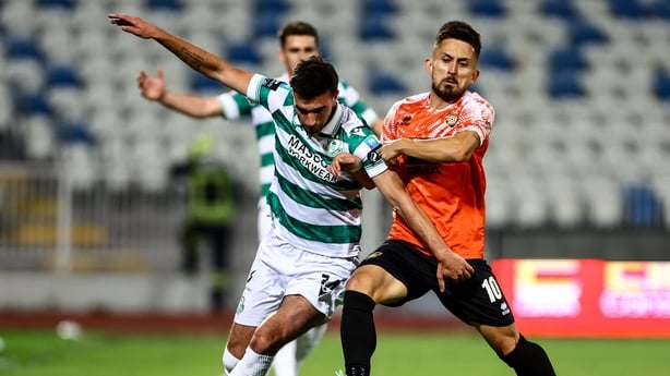 Danny Mandroiu of Shamrock Rovers in action against Almir Kryeziu of Ballkani - 2025 Conference League