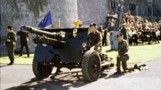 Members of the 6th Field Artillery Regiment, Kildare, operate a 25-pounder during a performance of …