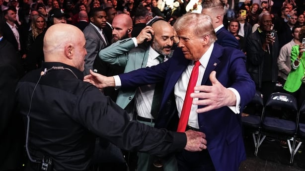 Joe Rogan greets President-elect Donald Trump during the UFC 309 event at Madison Square Garden on 16 November 2024