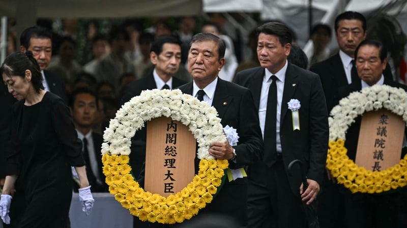 Japan's Prime Minister Shigeru Ishiba prepares to lay a wreath during the annual memorial ceremony for the victims at the Peace Park in Nagasaki