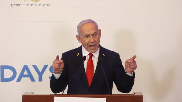 Israel's Prime Minister Benjamin Netanyahu gestures as he speaks at a event in Jerusalem