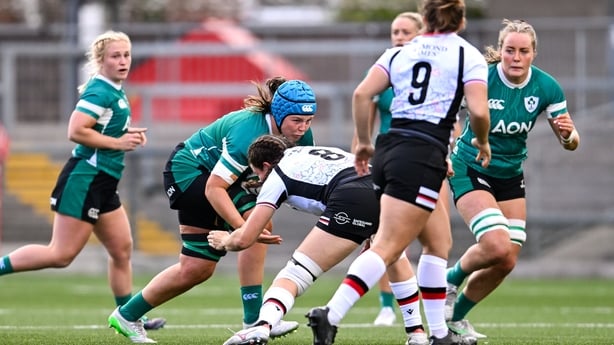 9 August 2025; Brittany Hogan of Ireland is tackled by Fabiola Forteza of Canada during the Women's Rugby World Cup warm-up match between Ireland and Canada at Affidea Stadium in Belfast. Photo by Ramsey Cardy/Sportsfile