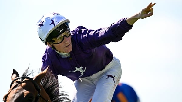 9 August 2025; Jockey David Egan celebrates on Power Blue after winning the Keeneland Phoenix Stakes at The Curragh Racecourse in Kildare. Photo by Seb Daly/Sportsfile